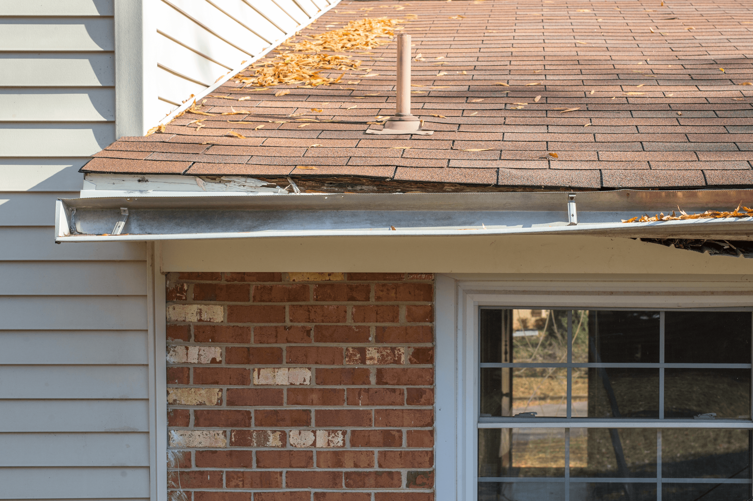 Damaged gutter section in need of repair