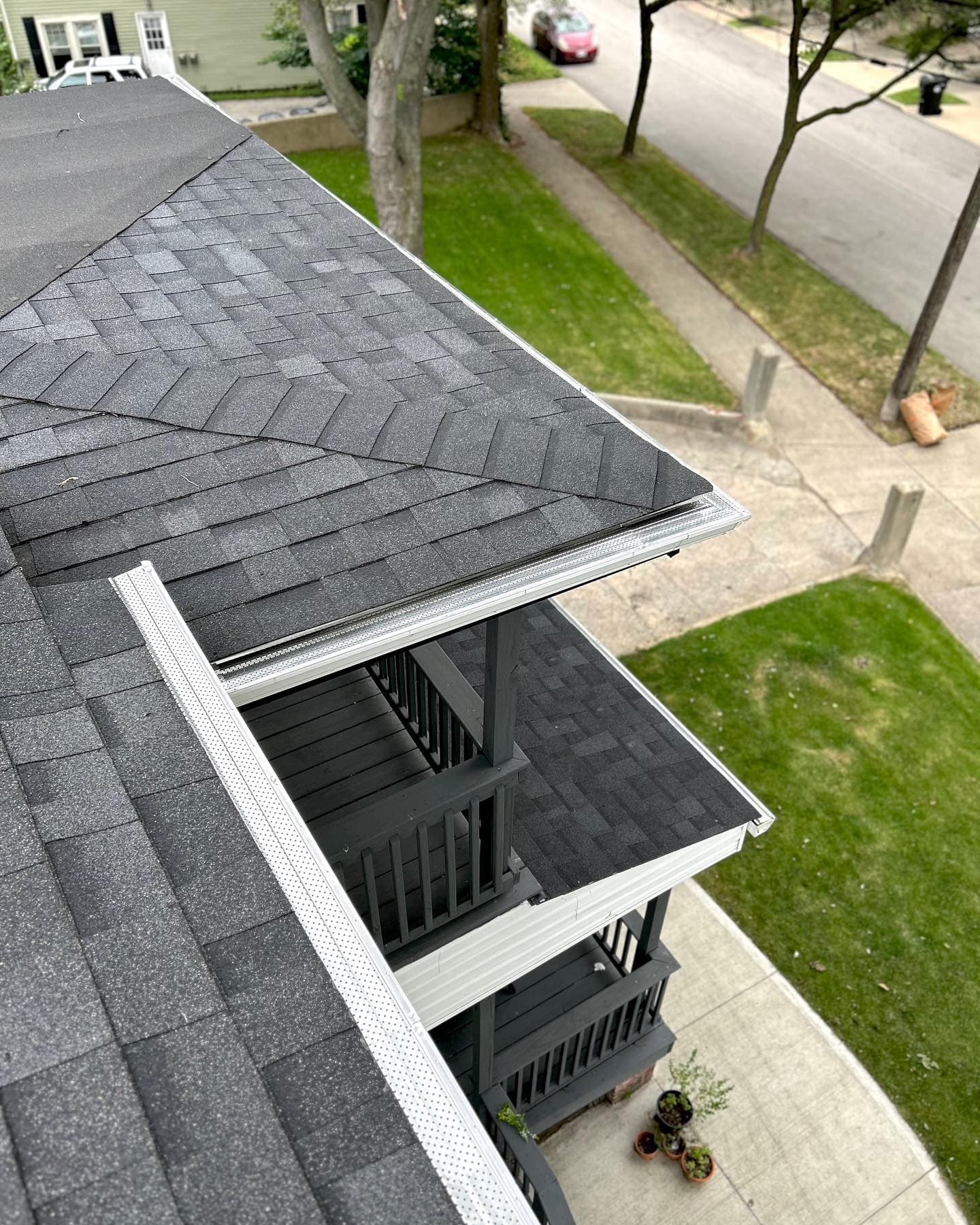 Zipco Leaf Shield perforated aluminum leaf protection on installed gutters
